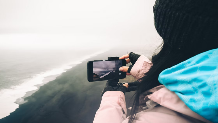 An image of a person taking a wide shot on the smartphone.