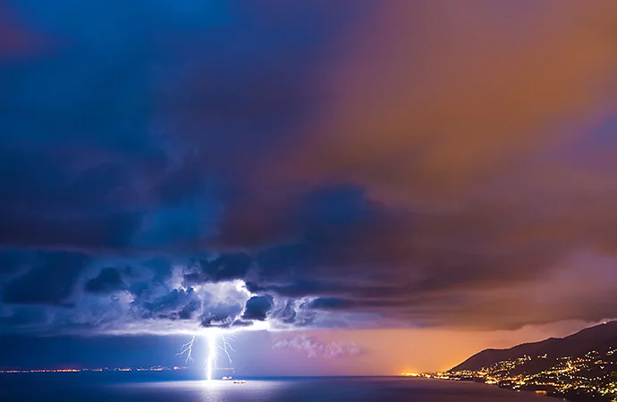 Photo of lightning striking the water off the coast