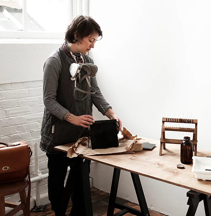 A photographer setting up a tintype camera