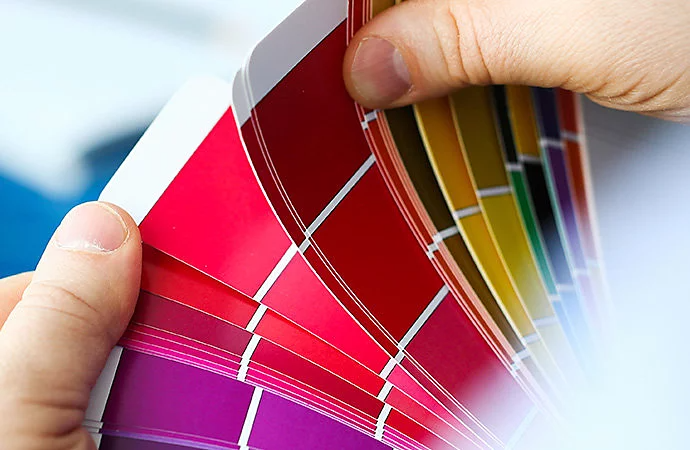 Person browsing through colour swatches