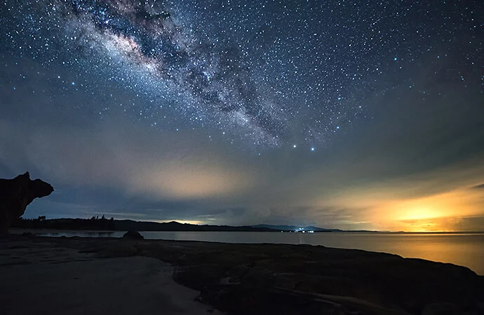 Astrophotography of the Milky Way captured while facing towards the horizon