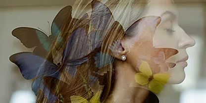 Images of butterflies and the side of a person's face are combined with opaque layering