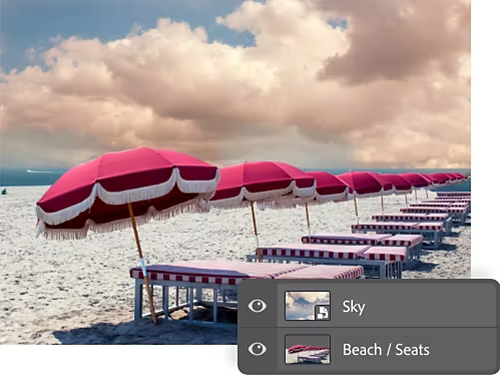 An example of Smart Objects that have been combined. An image of a cloudy sky has been combined with an image of a beach to create a new image.