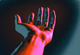 A photo of a person's wrist and hand that has been edited using a gradient map.