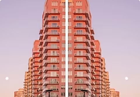 An image of a tall building that has been vertically cropped in half and mirrored.