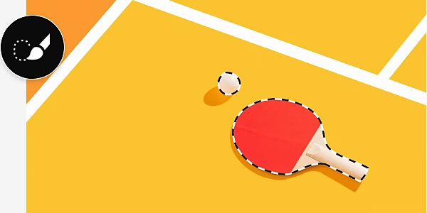 An image of a ping-pong paddle and ball on a table. The paddle and ball are selected and have a dotted line border around them.