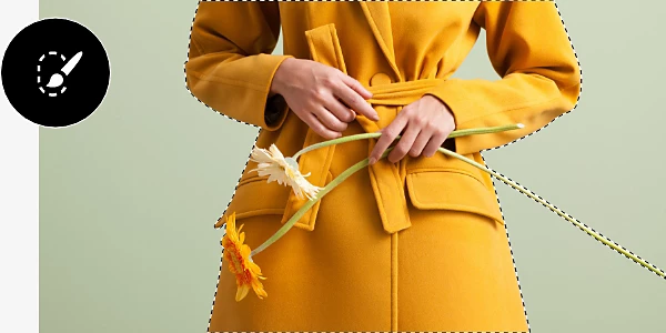 Refine Edge tool being used to adjust a picture of a person wearing a yellow jacket.