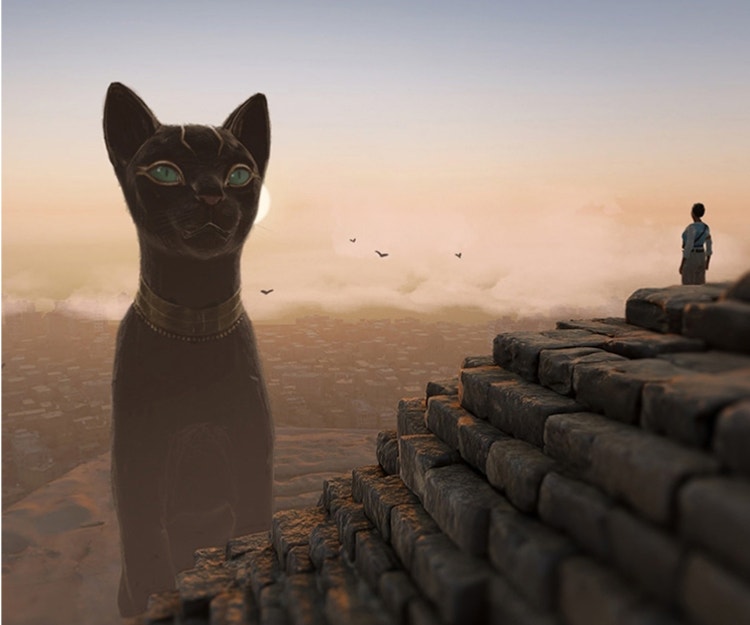 Large Cat statue next to a pyramid