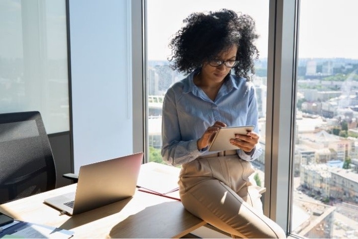 A patient looking over a notice of privacy practices on a tablet before signing it with Adobe Acrobat Sign