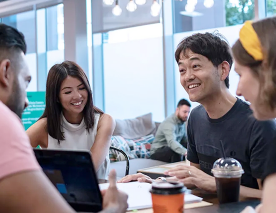 A group of people around a table