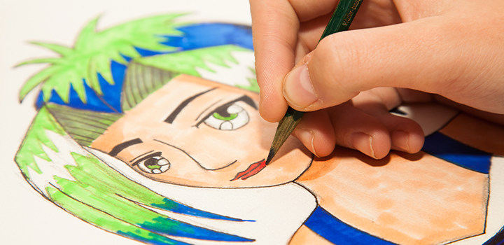 Artist drawing a manga-style character with blue and green hair.