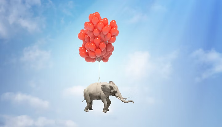 Elephant with balloon